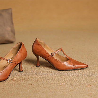 Stylish black T-strap dress heels for women, confidence-boosting formal footwear.