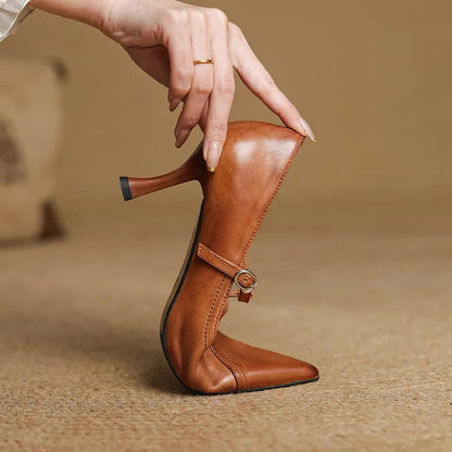 Brown T-strap elegant heels, versatile women's shoes for parties or office wear.