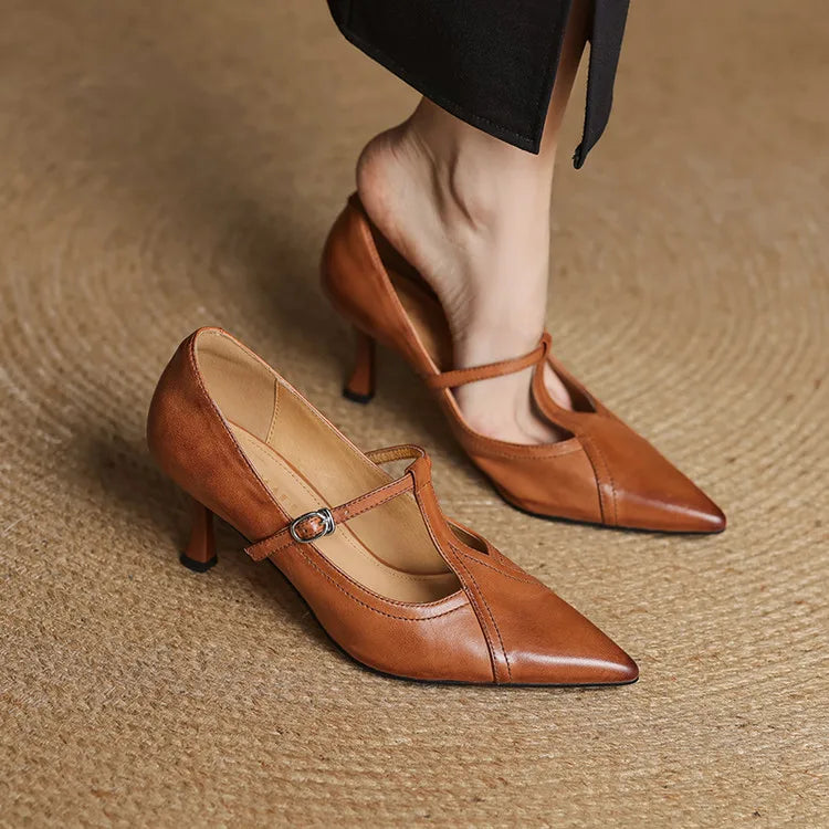 Elegant black T-strap party heels for women, perfect for special occasions.