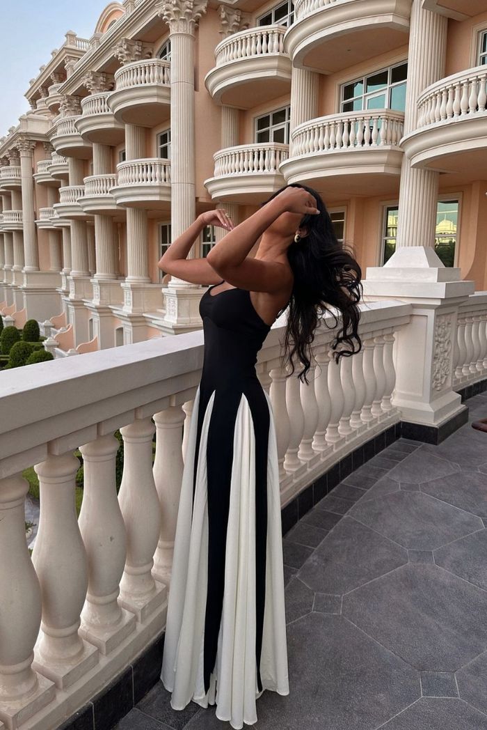 Stylish women's black & white evening maxi dress, comfortable & elegant for special occasions like parties.