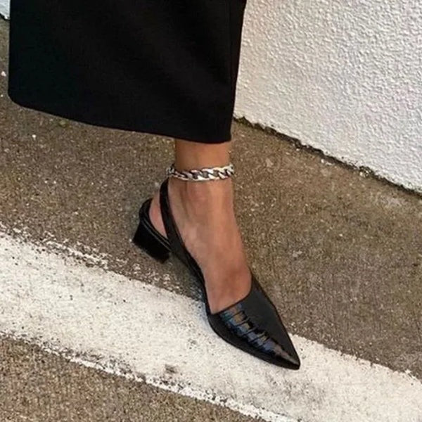 Classic brown orthopedic pumps for women, offering comfortable heels & stylish support for work or dress occasions.