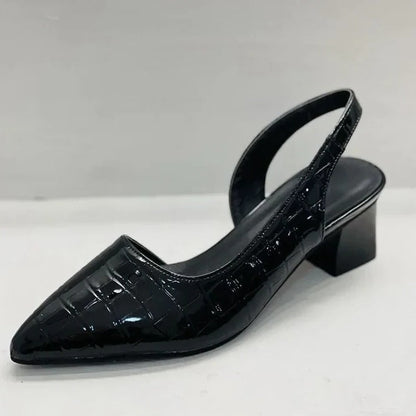 Women's classic black orthopedic pumps with comfortable heels, excellent arch support, & elegant work shoe style.