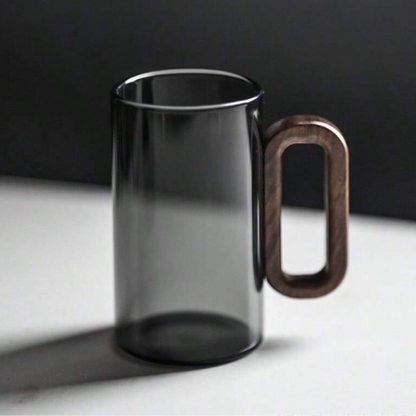 Durable borosilicate glass coffee mug with a sleek design and comfortable walnut handle. Great for daily use.