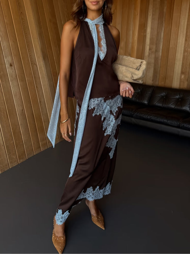 Boho-style women's brown maxi dress, elegant tie-dye, halter V-neck, and attractive side slit.