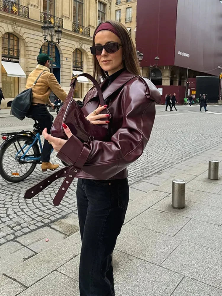 Elegant burgundy women's jacket with a sophisticated vintage style, perfect for seasonless chic apparel.