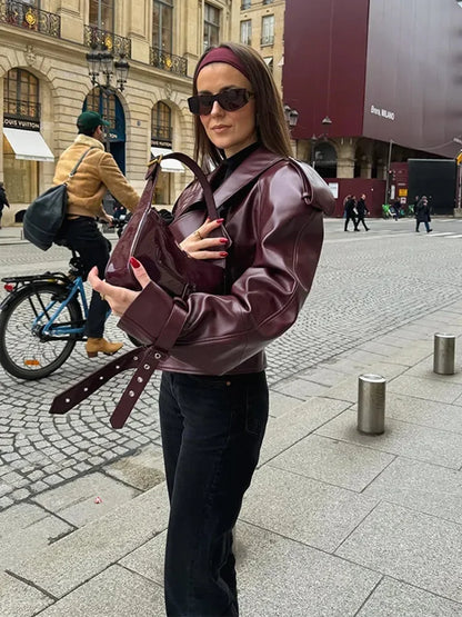 Elegant burgundy women's jacket with a sophisticated vintage style, perfect for seasonless chic apparel.