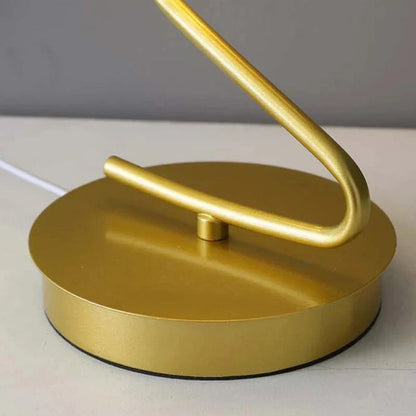 Sleek modern LED table lamp featuring an elegant butterfly design, perfect for home accent lighting.