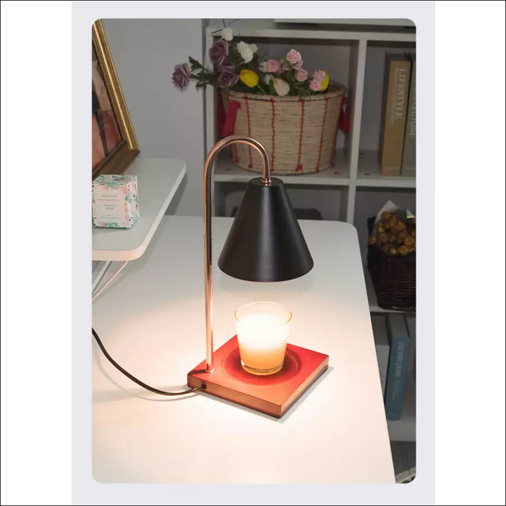 Contemporary candle warmer lamp, adjustable heat & light, flame-free aromatherapy for modern home.
