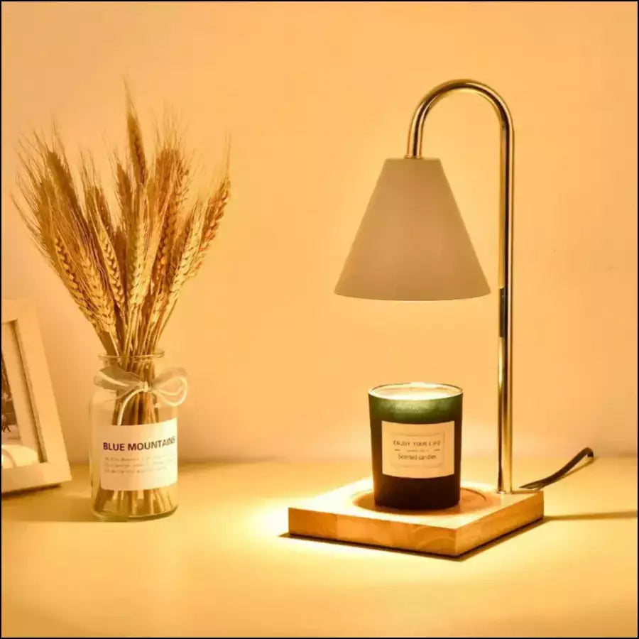 Sleek modern candle warmer lamp, sophisticated design, perfect aromatherapy & home decor piece.