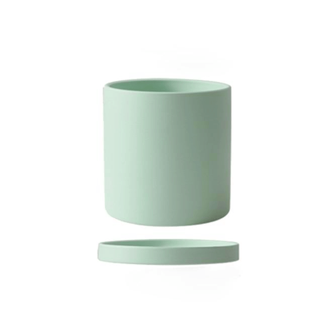 Premium ceramic planter for indoor plants, featuring a separate drainage saucer.