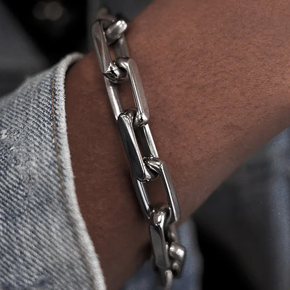 Sophisticated chainlink bracelet, a versatile fashion accessory with a secure toggle clasp closure.