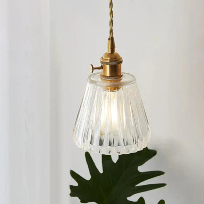 Stylish glass lighting fixture, perfect for dining and kitchen.