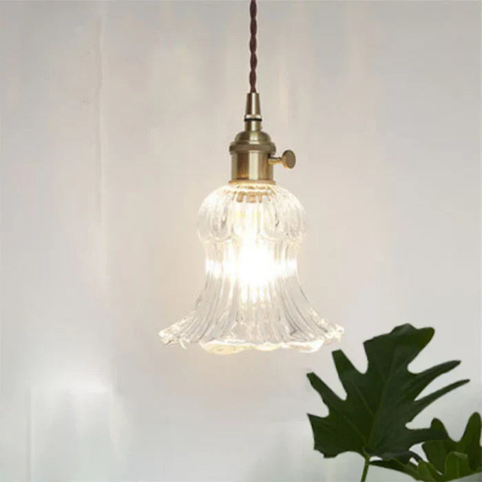 OpulentGlow elegant glass pendant, brightening modern spaces.
