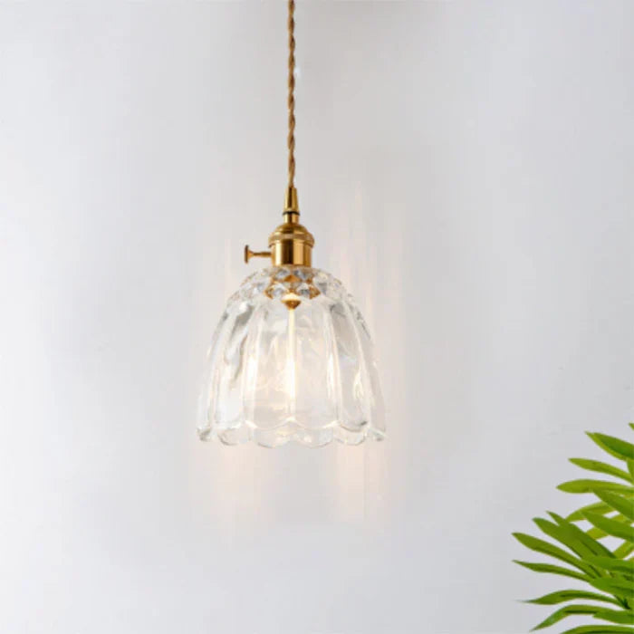 Decorative glass ceiling lamp, bringing ambient light to dining.