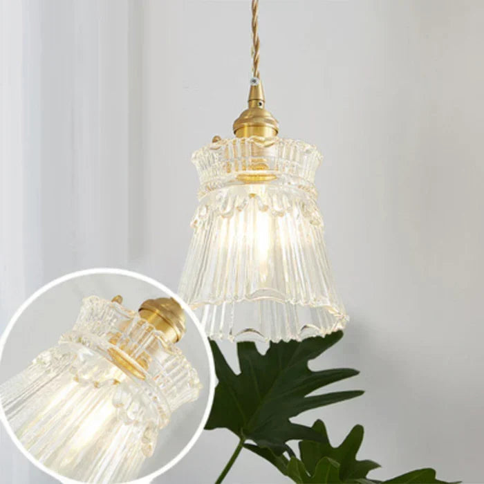 Modern industrial glass pendant lamp for contemporary kitchens.