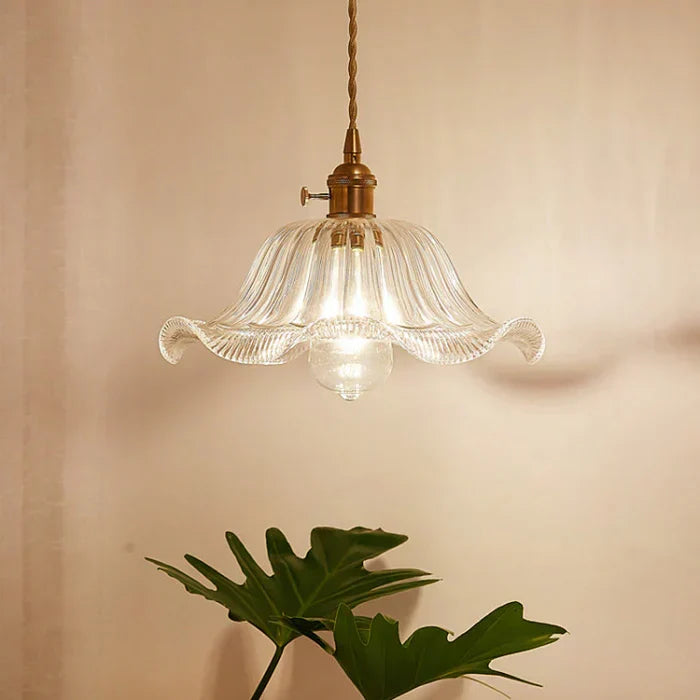 OpulentGlow clear glass pendant, a modern home lighting essential.