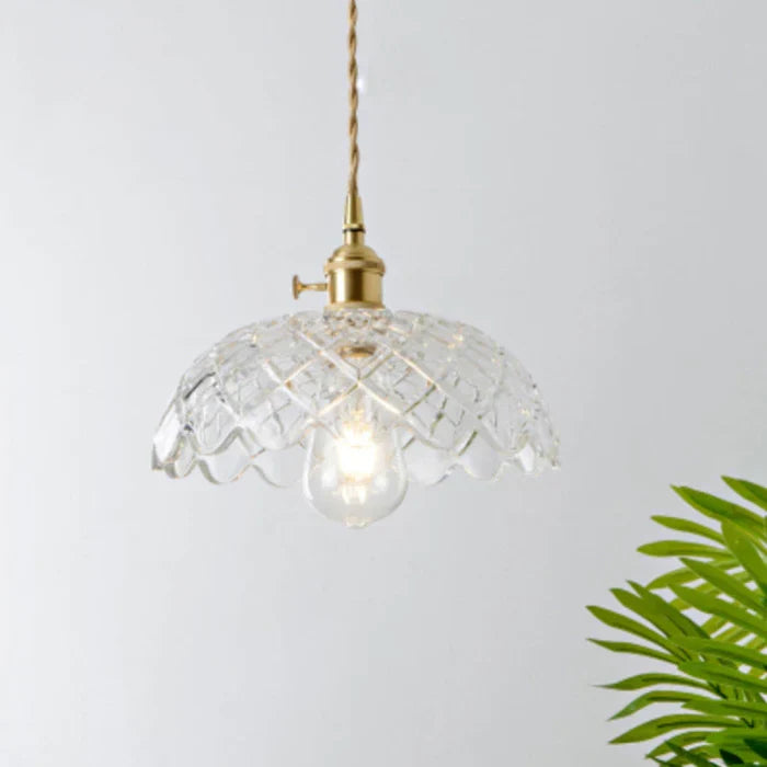 Transparent glass pendant fixture, adding a touch of modern class.