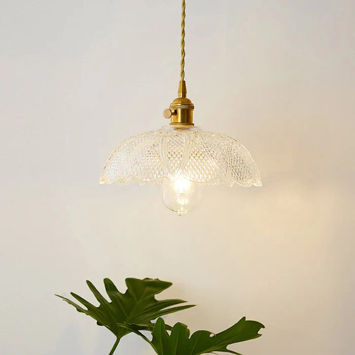Elegant clear glass ceiling light, a key modern home decor piece.