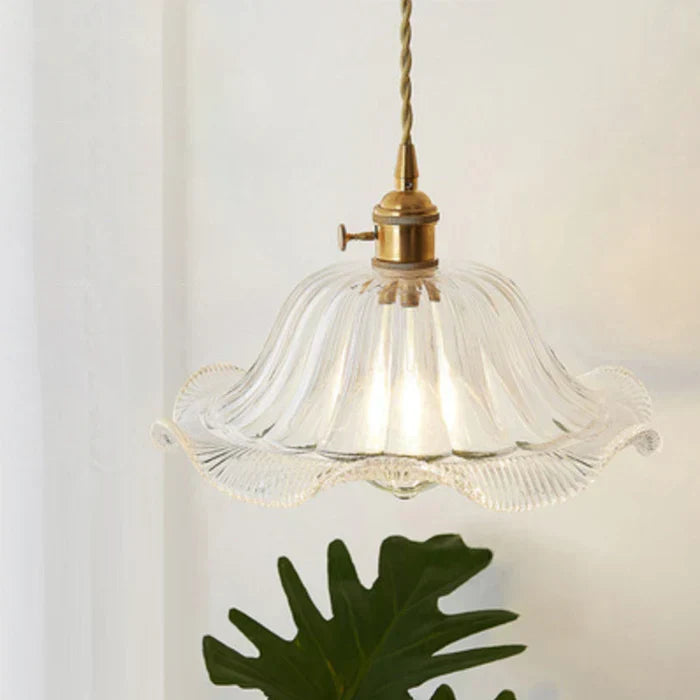 OpulentGlow modern pendant light with clear glass shade.