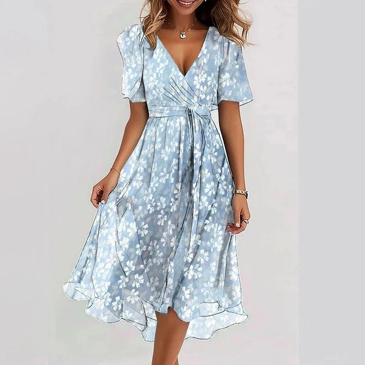 Stylish women's colorful midi dress with vibrant design. Elegant and versatile for any occasion.