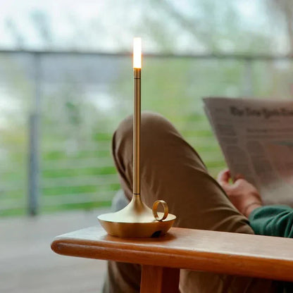 Contemporary cordless LED table lamp, elegant and rechargeable for versatile modern home lighting.