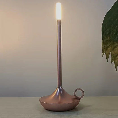 Ambient LED bedside lamp, elegant cordless design enhances modern bedroom lighting.