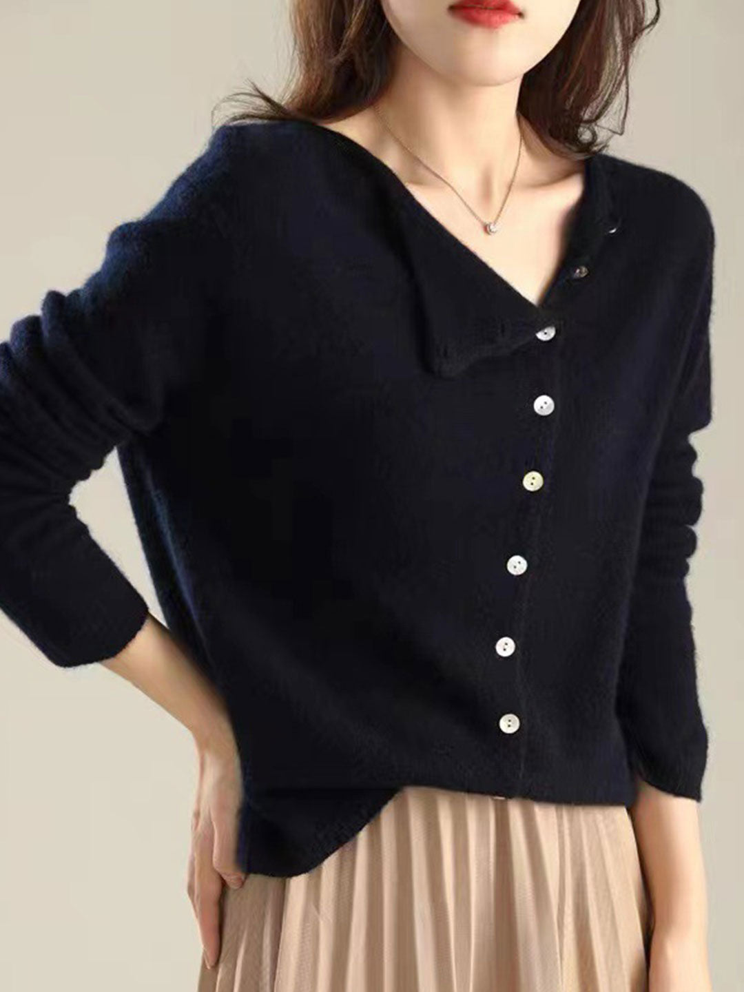 Chic women's Lilou cardigan. Elegant soft knit, cozy relaxed fit, long sleeve open front layering sweater.