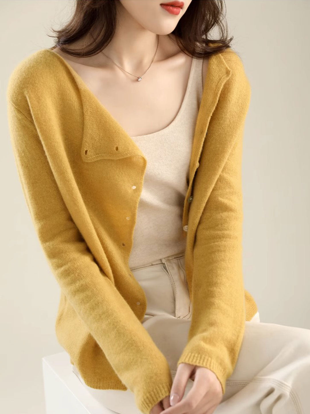 Women's long sleeve open front Lilou cardigan. Cozy knit, relaxed fit for elegant, versatile layering.