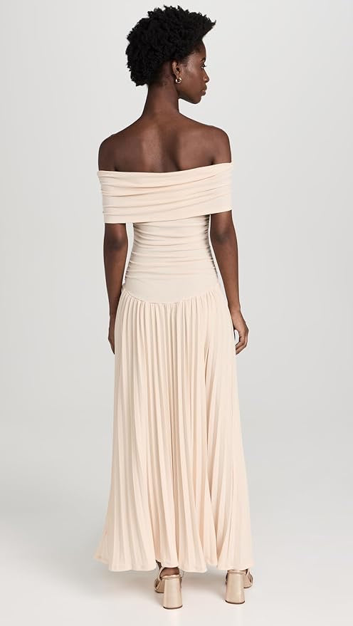 Cream off-shoulder pleated maxi dress, beautiful for any formal gathering.