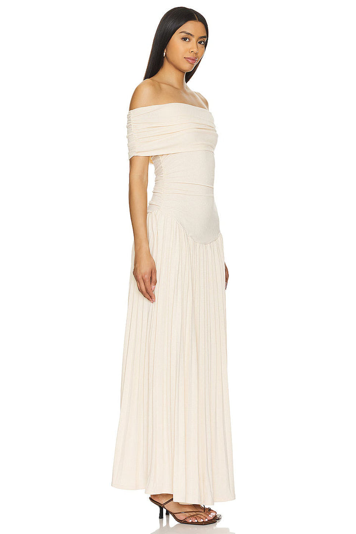 Sky blue off-shoulder pleated maxi dress for a romantic wedding guest look.