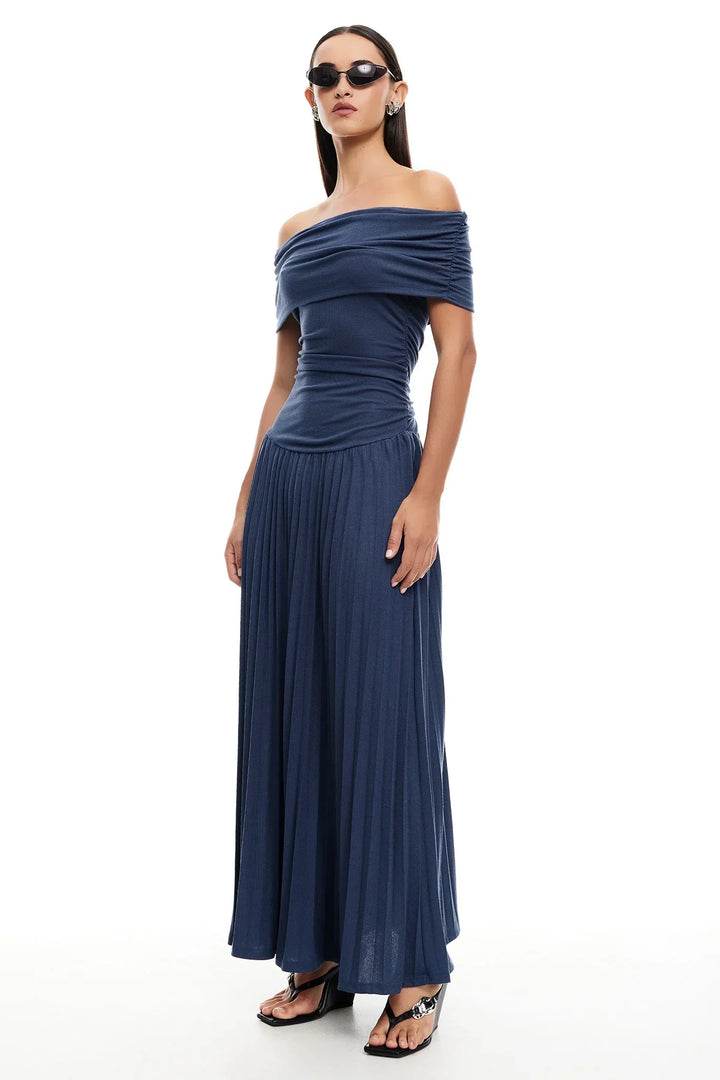 Cream off-shoulder pleated maxi dress, formal and elegant for any event.