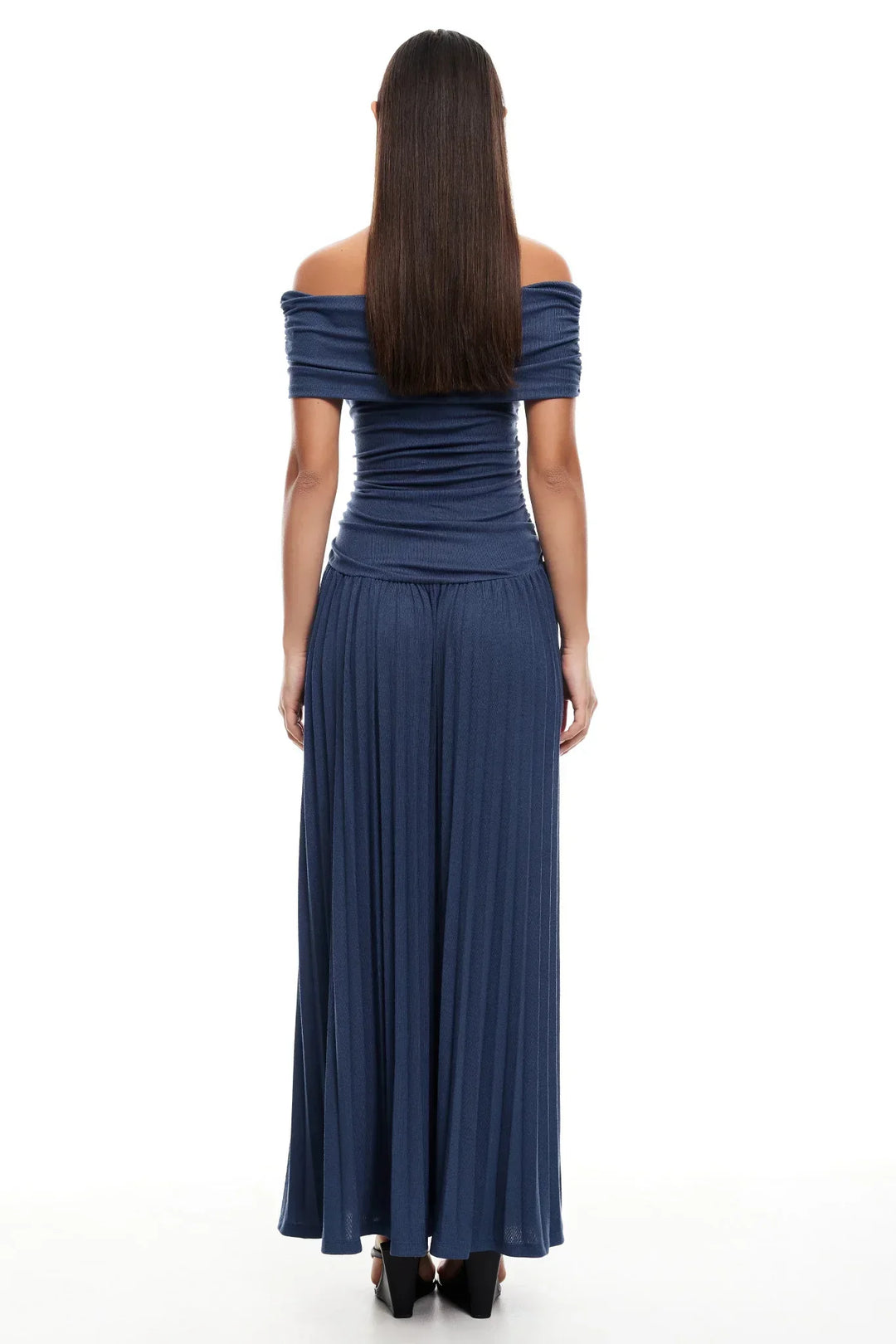 Sky blue off-shoulder pleated maxi dress with an elegant drop waist detail.