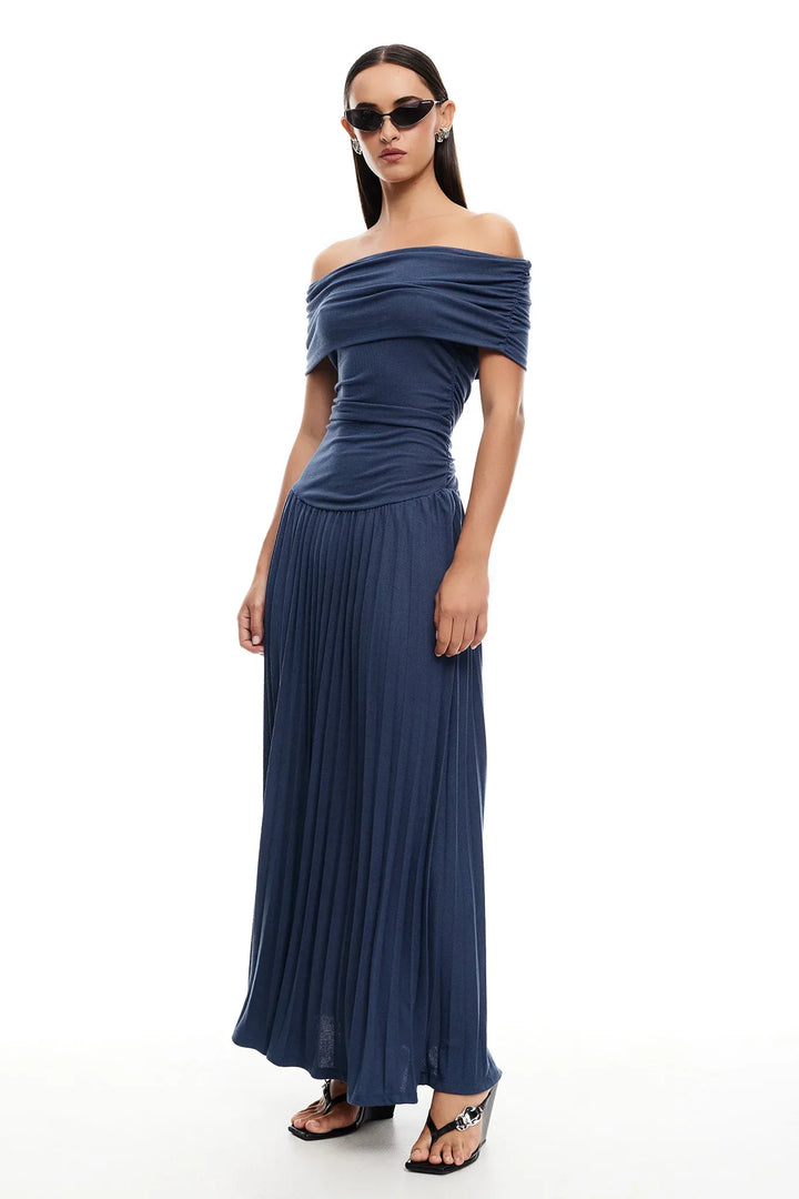Navy off-shoulder pleated maxi dress, a sophisticated evening wear choice.