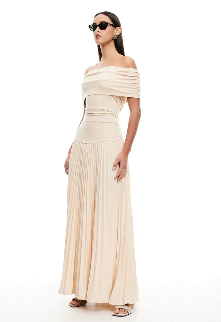Elegant cream off-shoulder pleated maxi party dress, stunning fashion.
