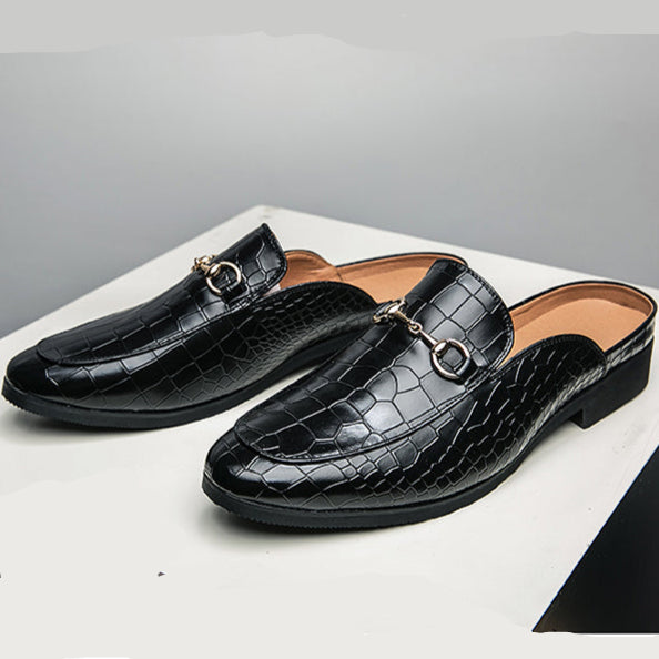 Versatile women's slip-on mules, croc-embossed for an elegant look. Comfortable, sophisticated formal/casual footwear.