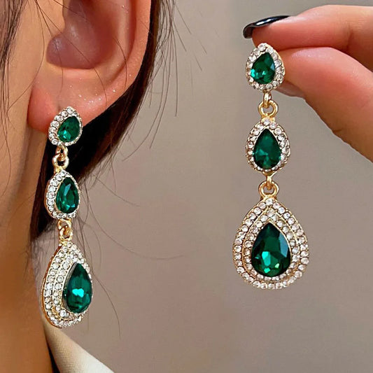 Elegant emerald green cascade drop earrings for women, perfect statement dangle jewelry.