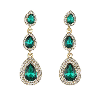 Women's vibrant emerald stainless steel drop earrings, a stylish elegant accessory.