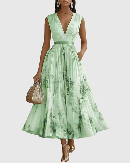 Full-length elegant floral pleated maxi dress for women, perfect for formal summer events.