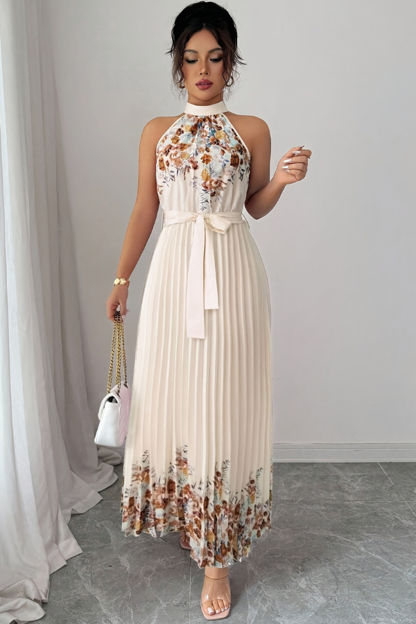 Elegant women's square neck floral dress, midi length with beautiful pleats. Perfect for any occasion.