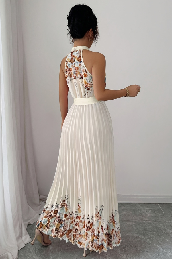 Sophisticated women's floral midi dress. Square neck, pleated details for a graceful summer style.