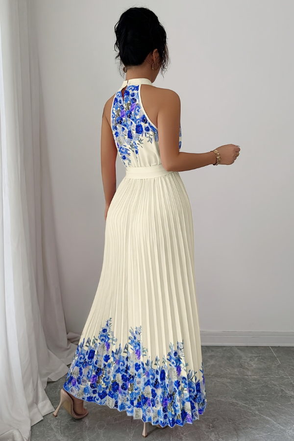 Beautiful floral print midi dress for women, featuring a square neckline and a flowy pleated skirt.