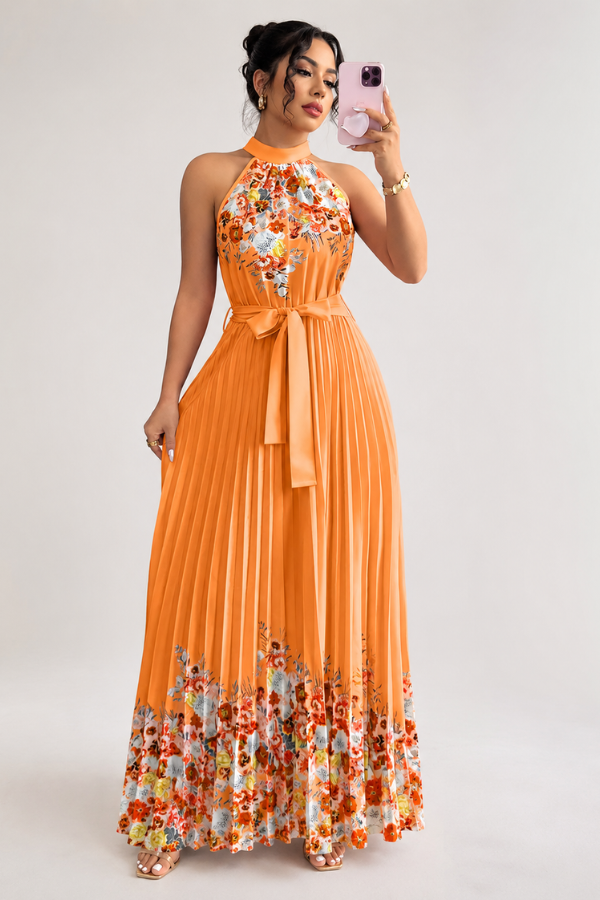 Day-to-night women's floral pleated midi dress with an elegant square neck. Stylish and comfortable.