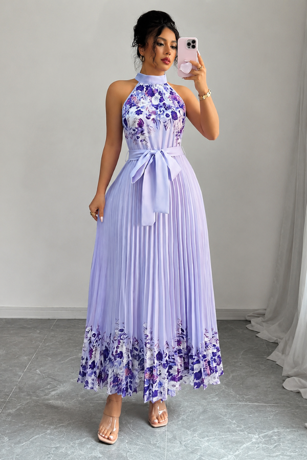 Chic women's floral pleated midi dress. Square neck design, ideal for vacation and day-to-night.