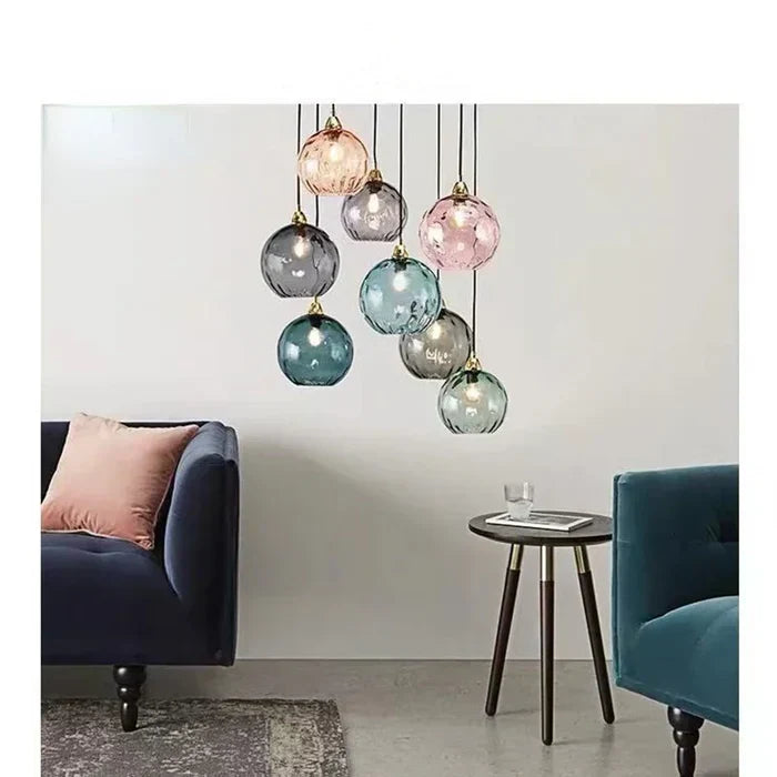 Elegant glass ball pendant lamp, modern ceiling fixture for stylish home decor.