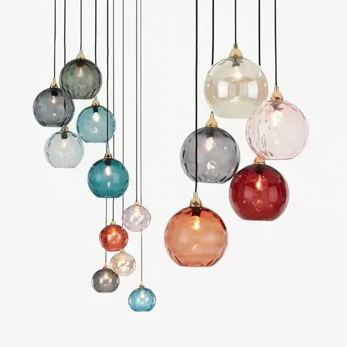 Modern glass ball pendant light, elegant ceiling fixture for bedroom or living spaces.