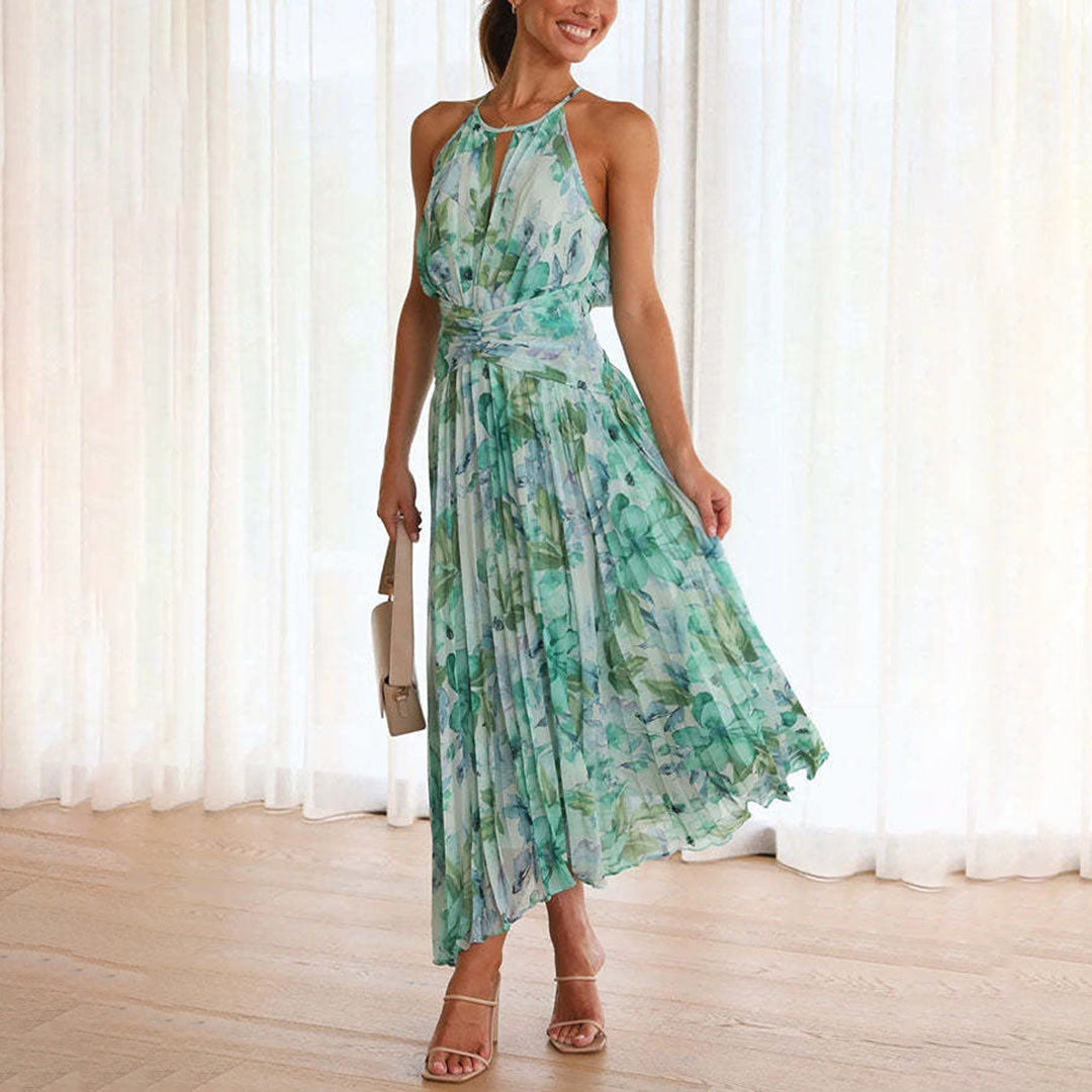 Elegant green floral halter maxi dress for women, perfect for wedding guests or summer parties.