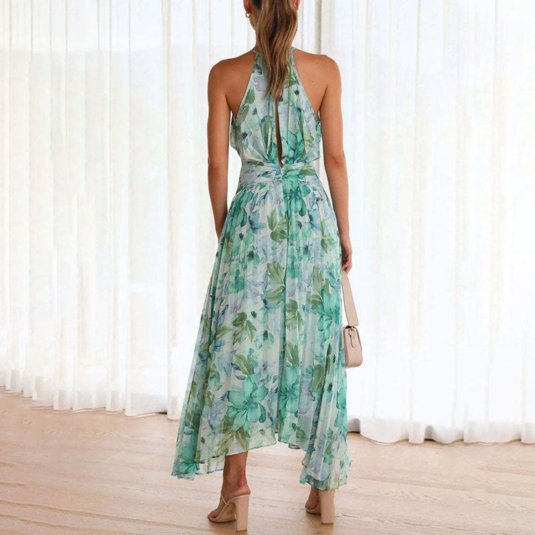 Vibrant green floral print halter maxi dress, a chic and elegant choice for summer events.