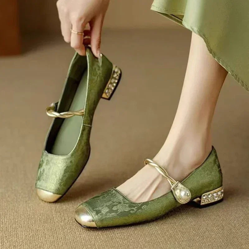 Elegant green square toe pumps for women, featuring a chic studded heel. Perfect for parties & evening wear.