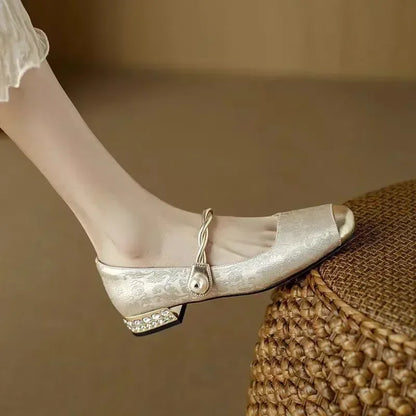 Comfortable women's square toe pumps, featuring an elegant studded heel, suitable for all-day wear.