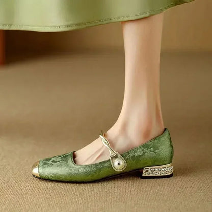 Versatile beige square toe pumps for women, showcasing an elegant studded heel. Ideal for office or evening.